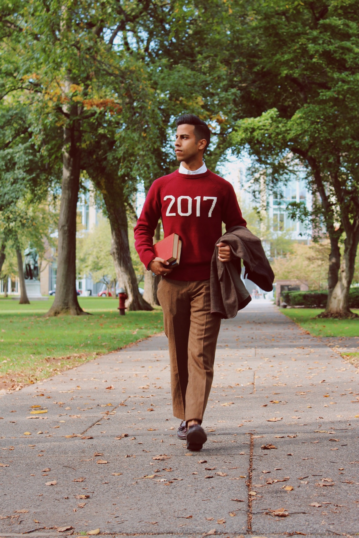 Parth Shingala wearing a red 2017 Hillflint sweater